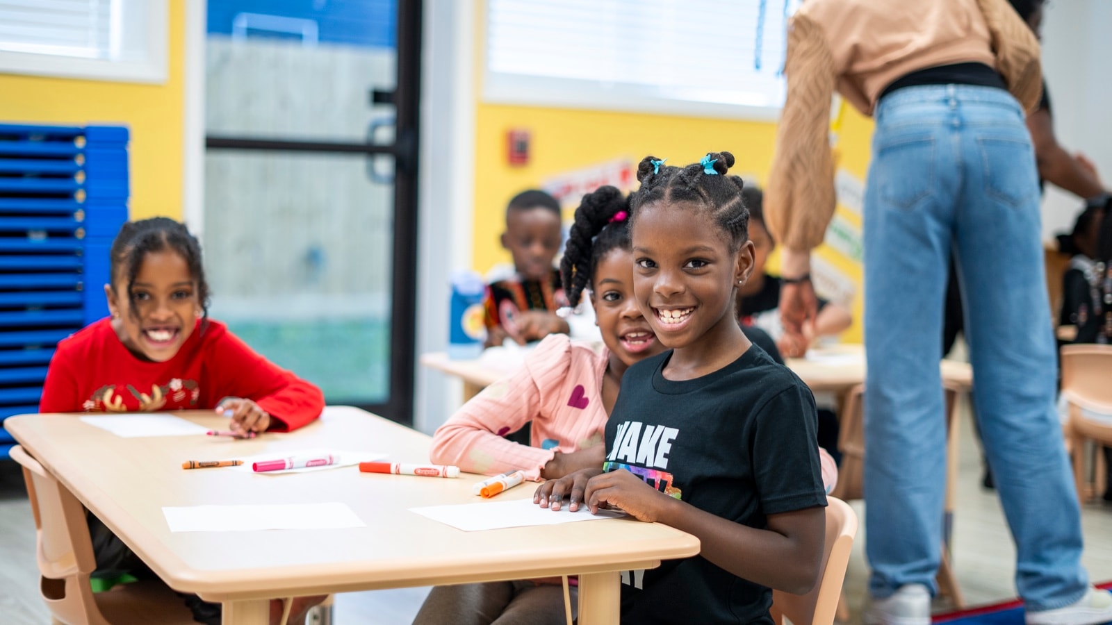 A smiling child at RIG Kidz Academy
