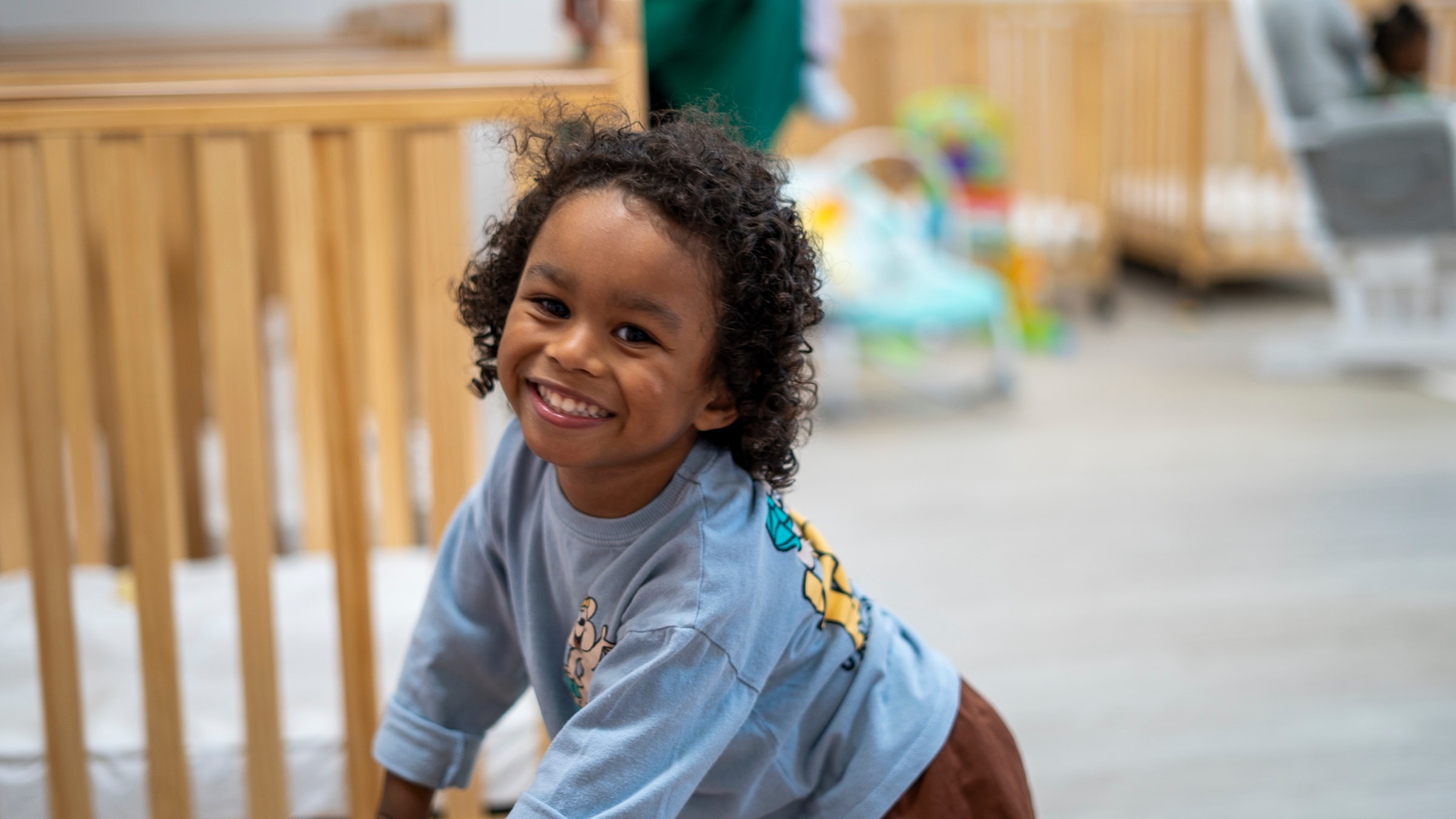 A joyful child at RIG Kidz Academy in Sunnyside